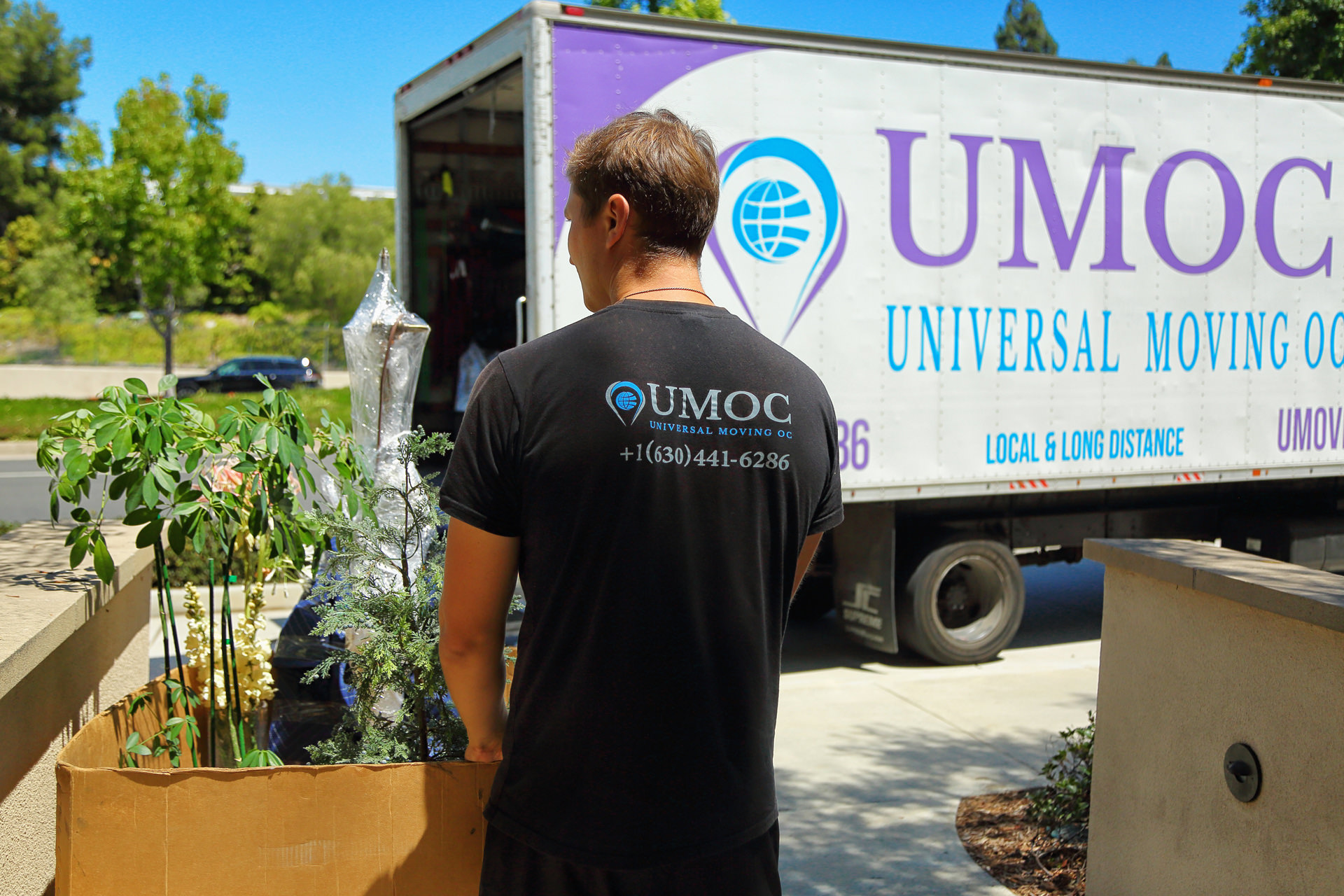 UMOC movers load things into a UMOC truck